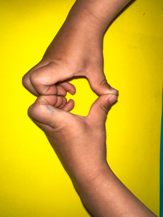 Child deeply concentrated on individual work at Spicebush Montessori School
