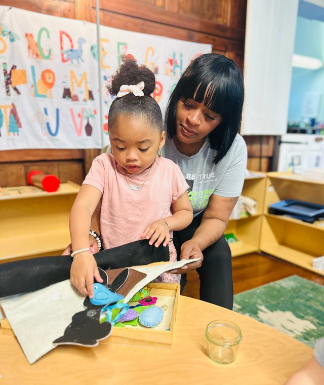 Child engaged in self-directed learning at Spicebush Montessori School