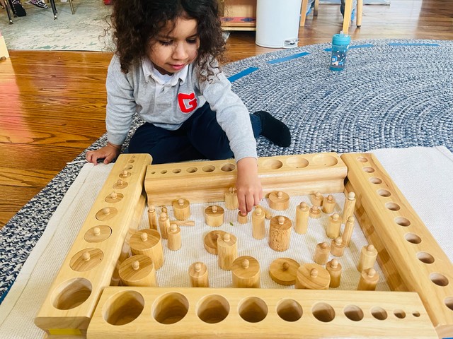 Hands working with cylinder blocks