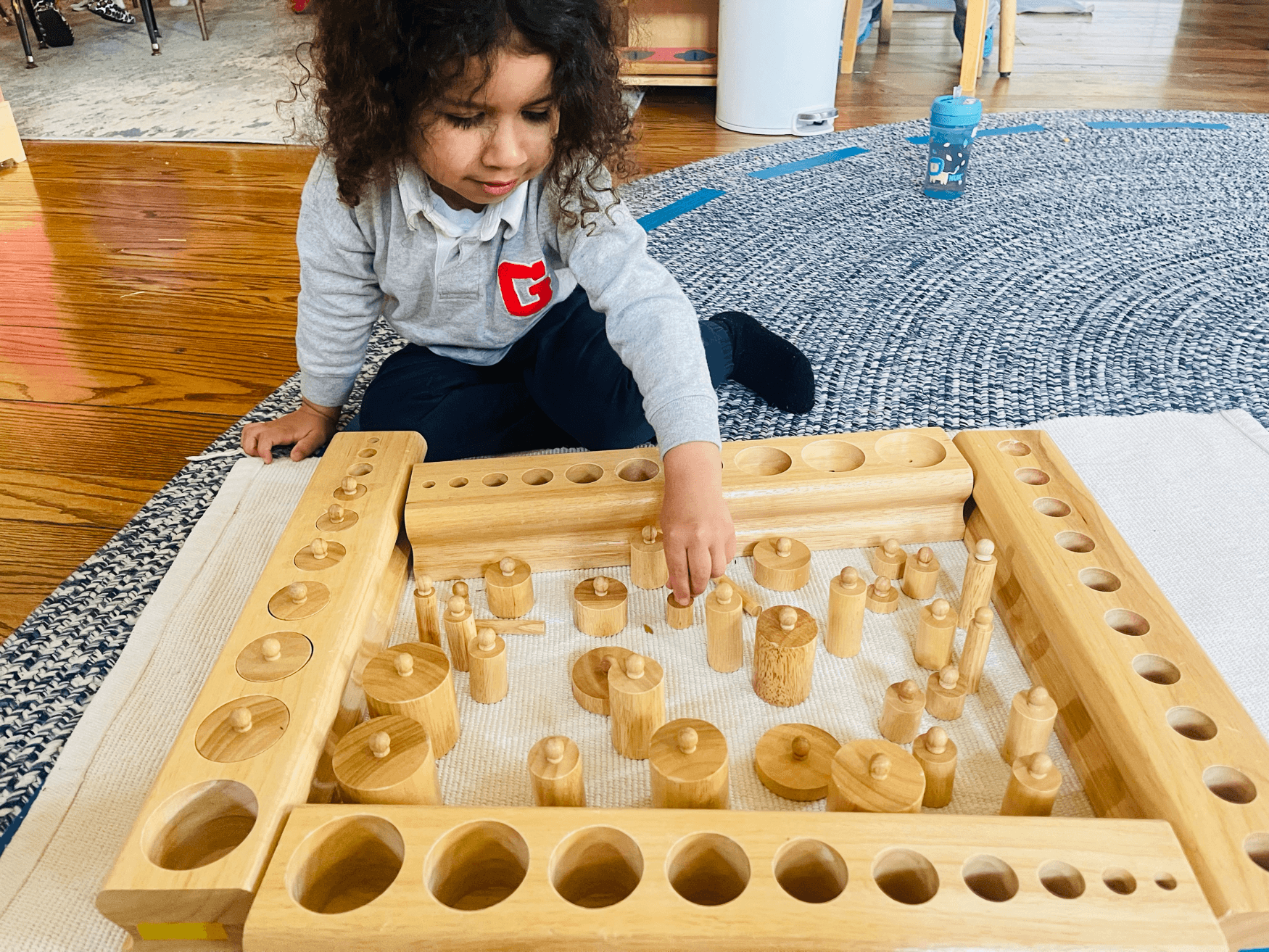 Hands working with cylinder blocks